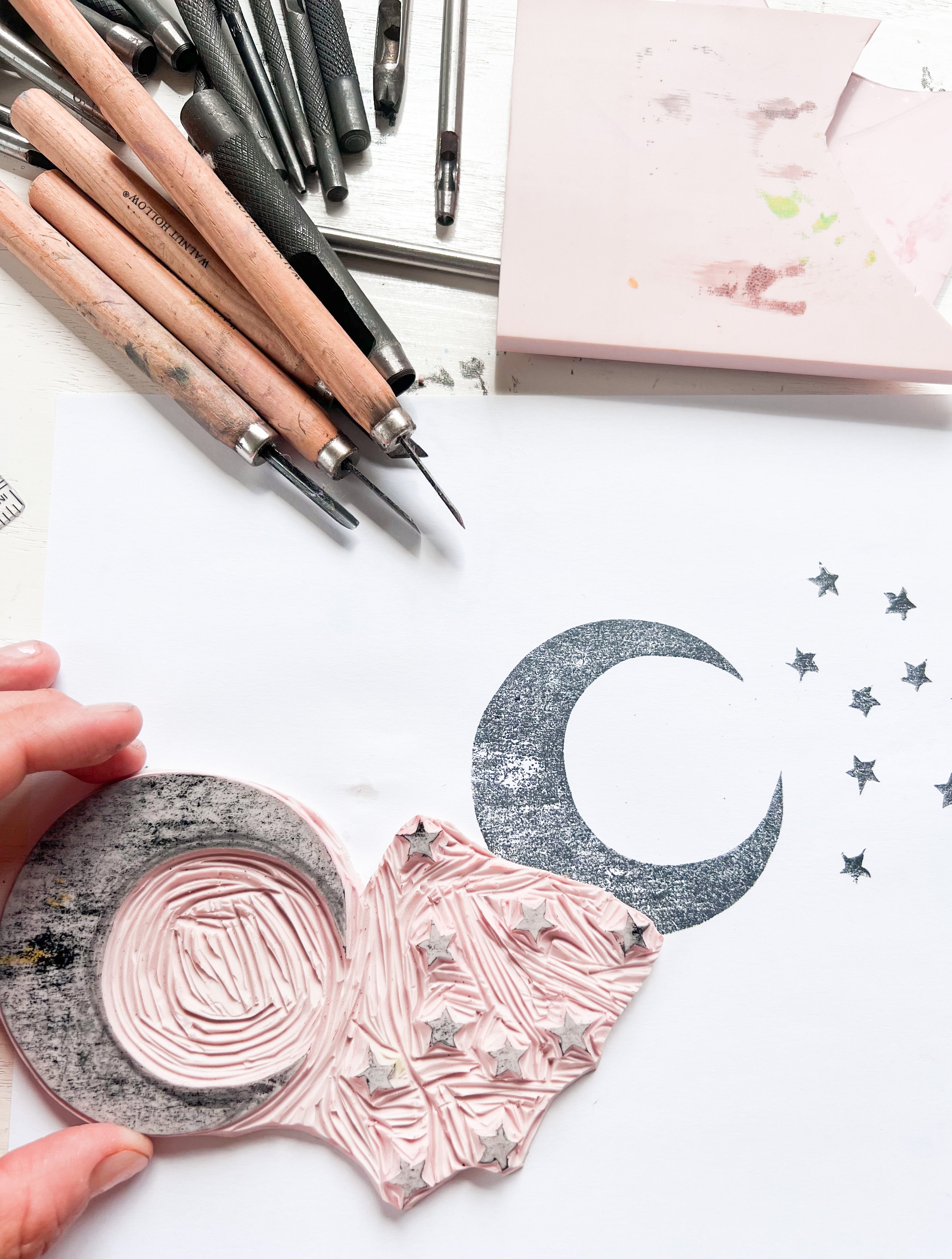Local artist Molly Sanders owner designer of Coca + B.™. Old fashion lino block printing