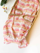 coastal cowgirl nursery decor. Pink sunset wave and sun swaddle