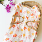 hawaiian print floral baby swaddle in moses basket