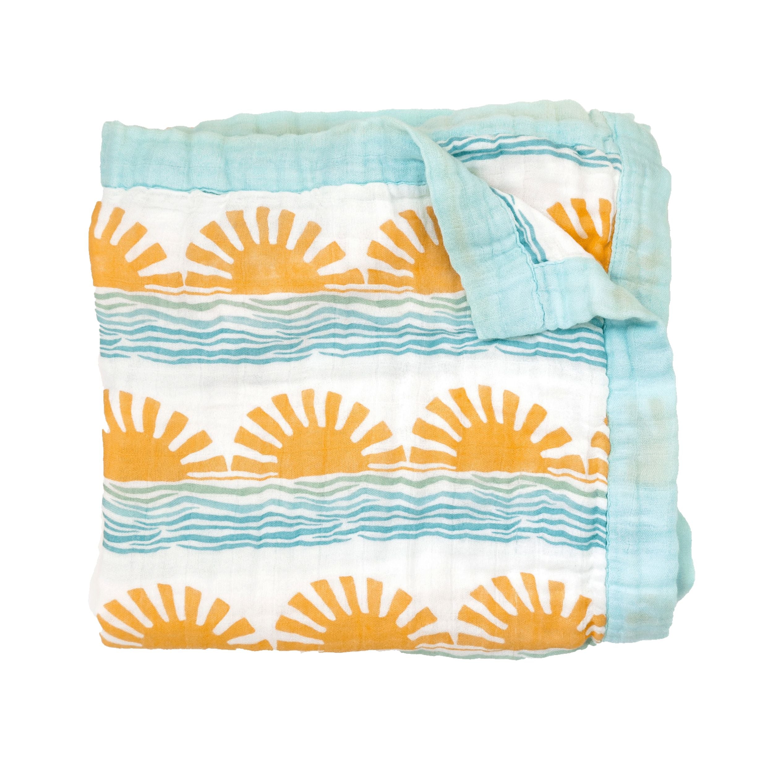 folded ocean wave and sun print organic baby blanket